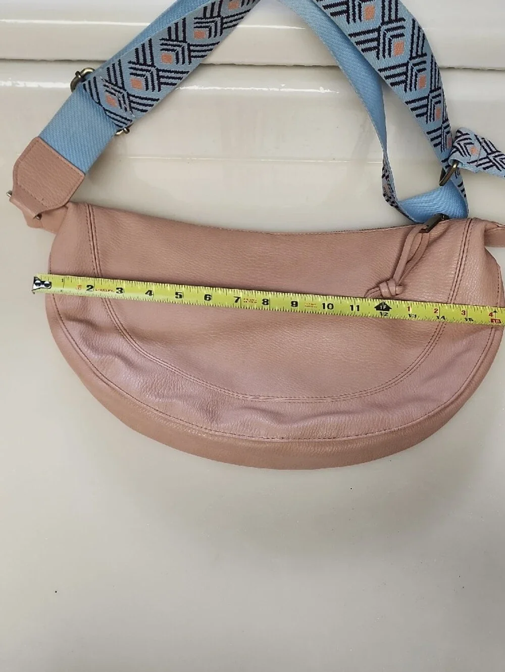 Urban Originals Peach Crescent Crossbody with Patterned Blue Strap